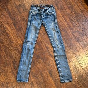 Rock Revival distressed skinny jeans